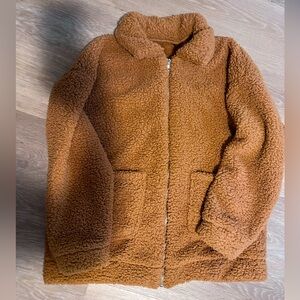 Camel colored teddy bear coat. Zip up with pockets.